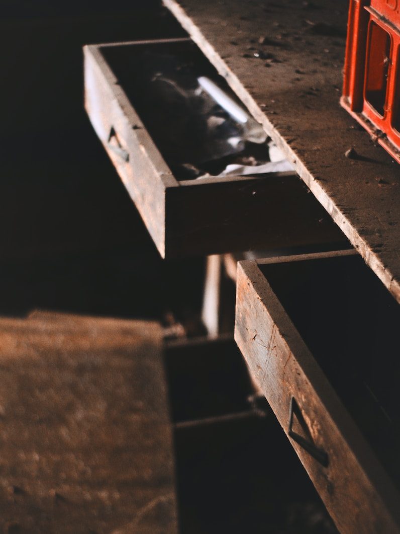 opened brown wooden drawers